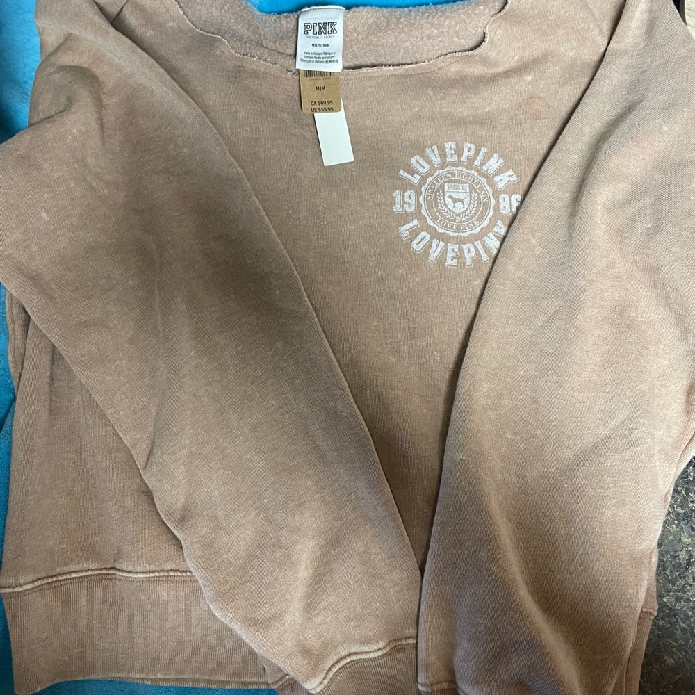 Pink off shoulder sweat shirt